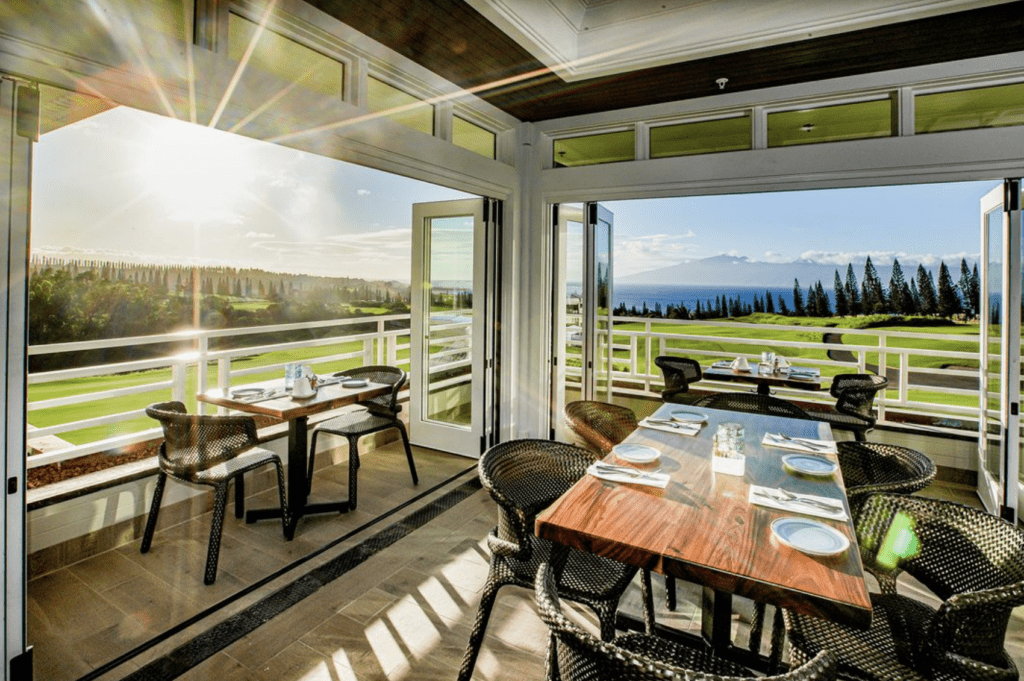 10 Best Maui Restaurants | Dining Guide for (2025) Hawaii Calling a table and chairs in a room with a view of the golf course