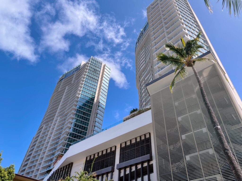 26 Best Places To Eat On Oahu, Hawaii | A Local Guide Hawaii Calling a tall buildings with trees and blue sky