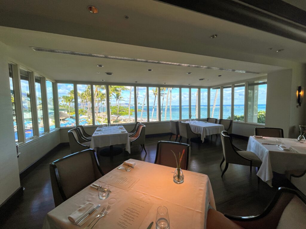 11 Best Sunday Brunch Buffets On Oahu Hawaii Calling a room with tables and chairs and a view of the ocean