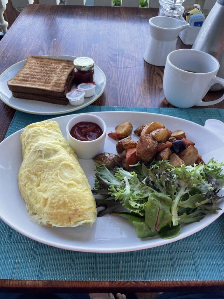 Legendary Sheraton Waikiki Vs. Moana Surfrider | 6 Things to Consider Hawaii Calling a plate of food on a table