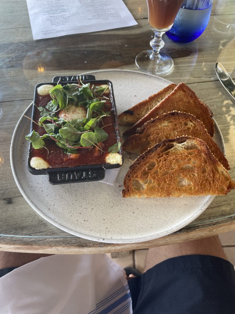 Relaxed Oceanside Hau Tree Brunch Review Hawaii Calling a plate of food on a table