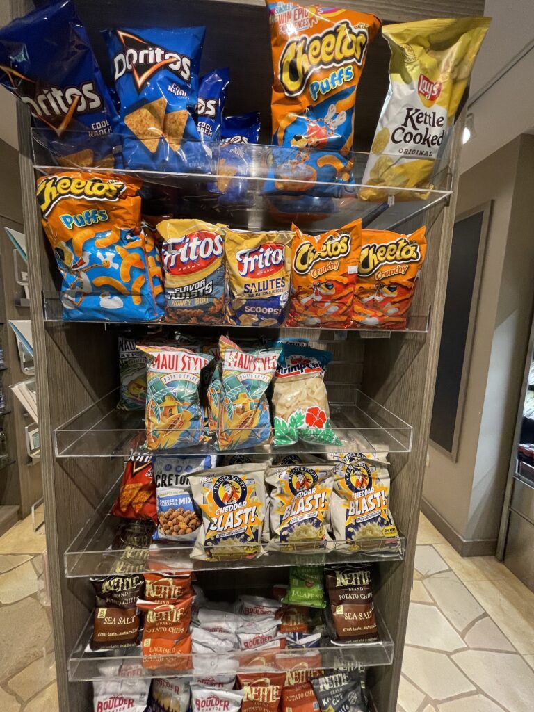 Review & Video | Marriott Ko Olina Beach Club An Amazing Location Hawaii Calling a shelf with bags of snacks