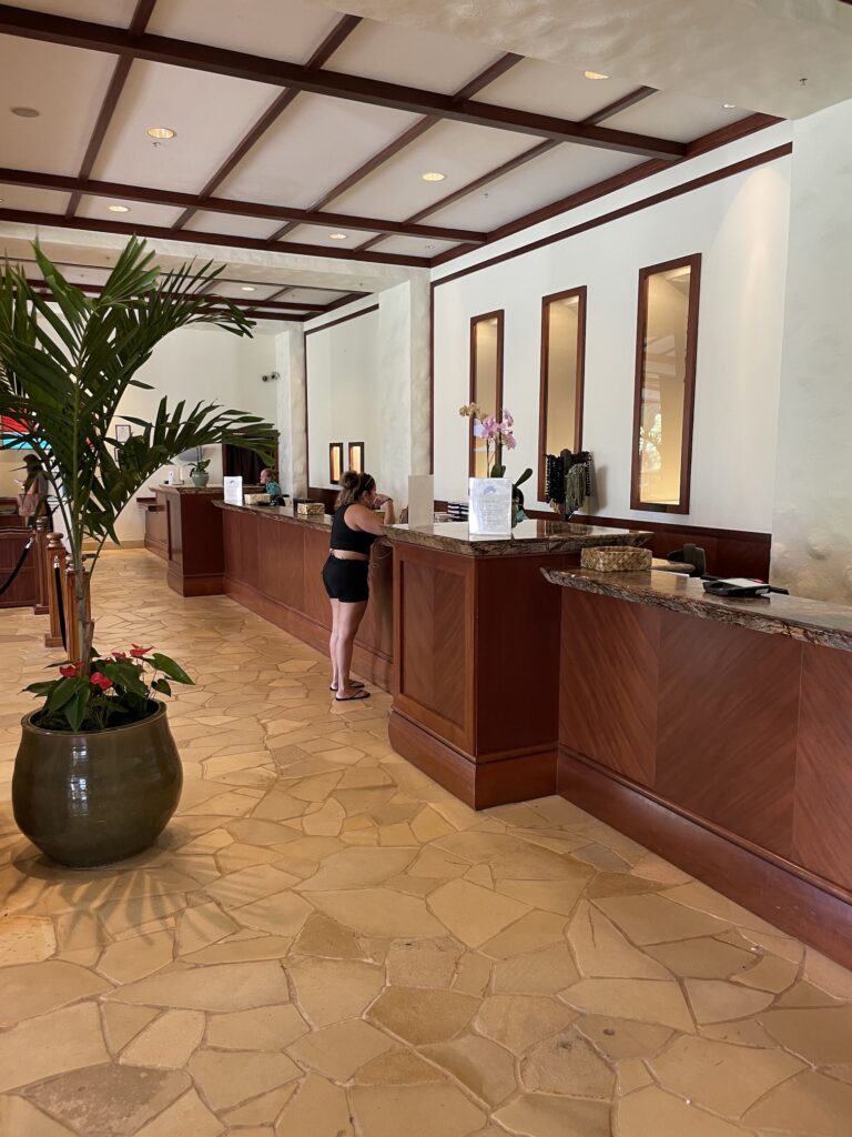 Review & Video | Marriott Ko Olina Beach Club An Amazing Location Hawaii Calling a woman standing at a reception desk