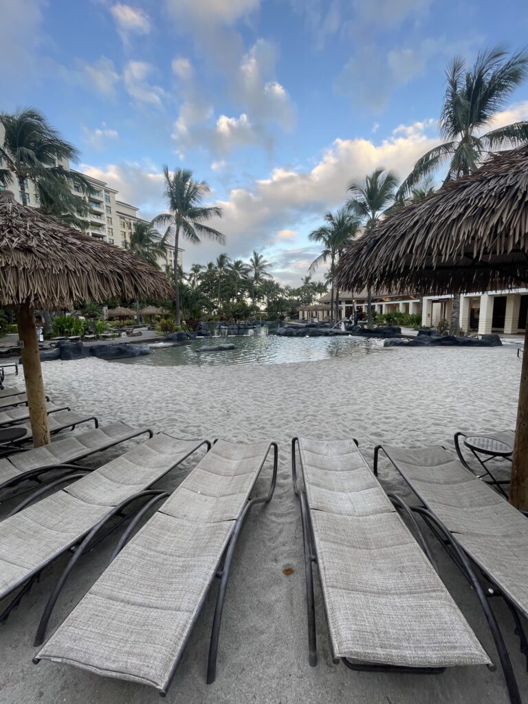 Review & Video | Marriott Ko Olina Beach Club An Amazing Location Hawaii Calling a pool with lounge chairs and palm trees