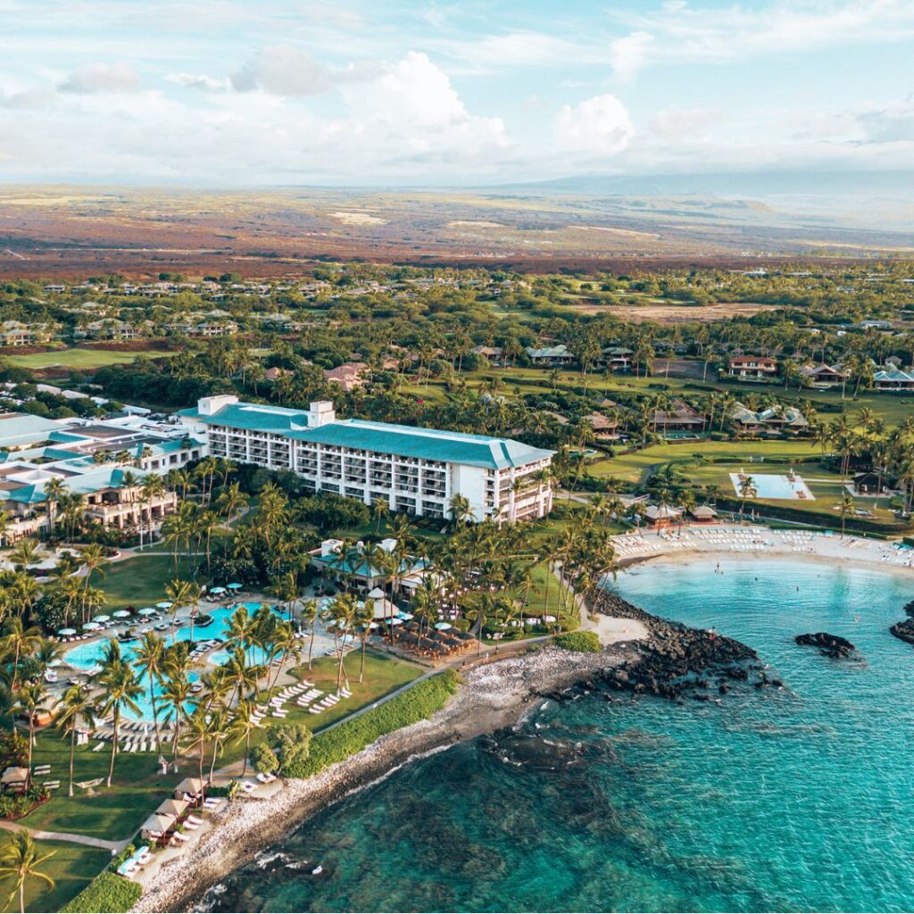 7 Best Family Hotels On The Big Island Hawaii Calling a resort with a body of water and a beach