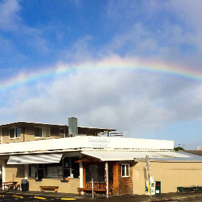 26 Best Places To Eat On Oahu, Hawaii | A Local Guide Hawaii Calling a rainbow over a building