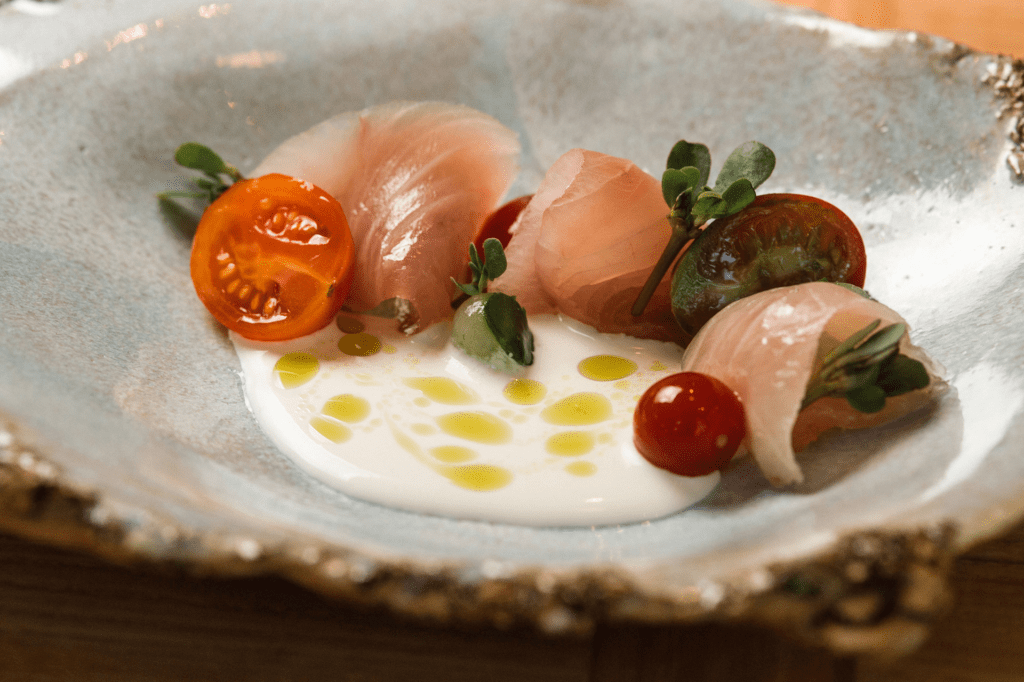 26 Best Places To Eat On Oahu, Hawaii | A Local Guide Hawaii Calling a plate of food with sauce and tomatoes