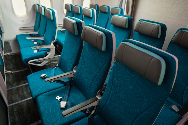 Hawaiian Airlines Reveals Luxurious Boeing 787 Dreamliner Cabins Hawaii Calling a row of blue seats in an airplane
