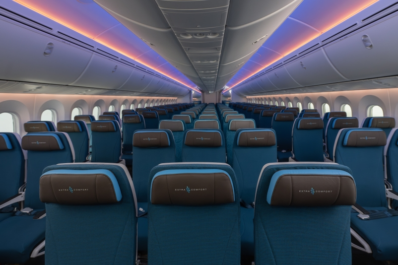 Hawaiian Airlines Reveals Luxurious Boeing 787 Dreamliner Cabins Hawaii Calling a row of blue and black seats in an airplane