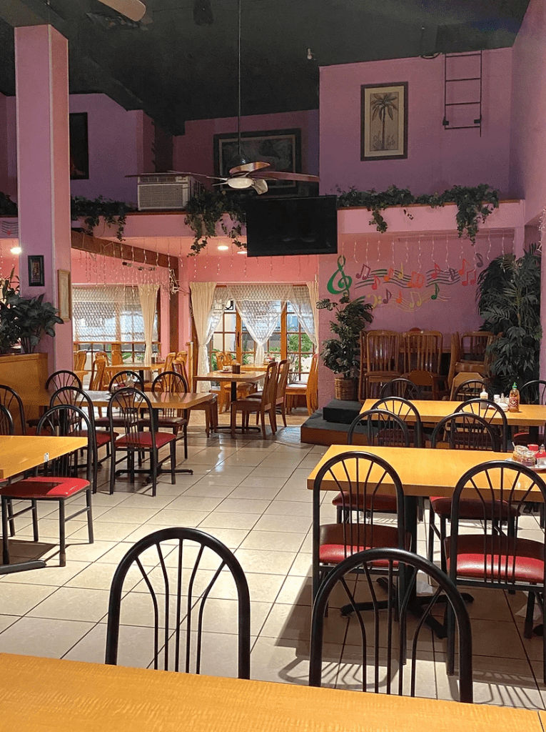 26 Best Places To Eat On Oahu, Hawaii | A Local Guide Hawaii Calling a room with tables and chairs