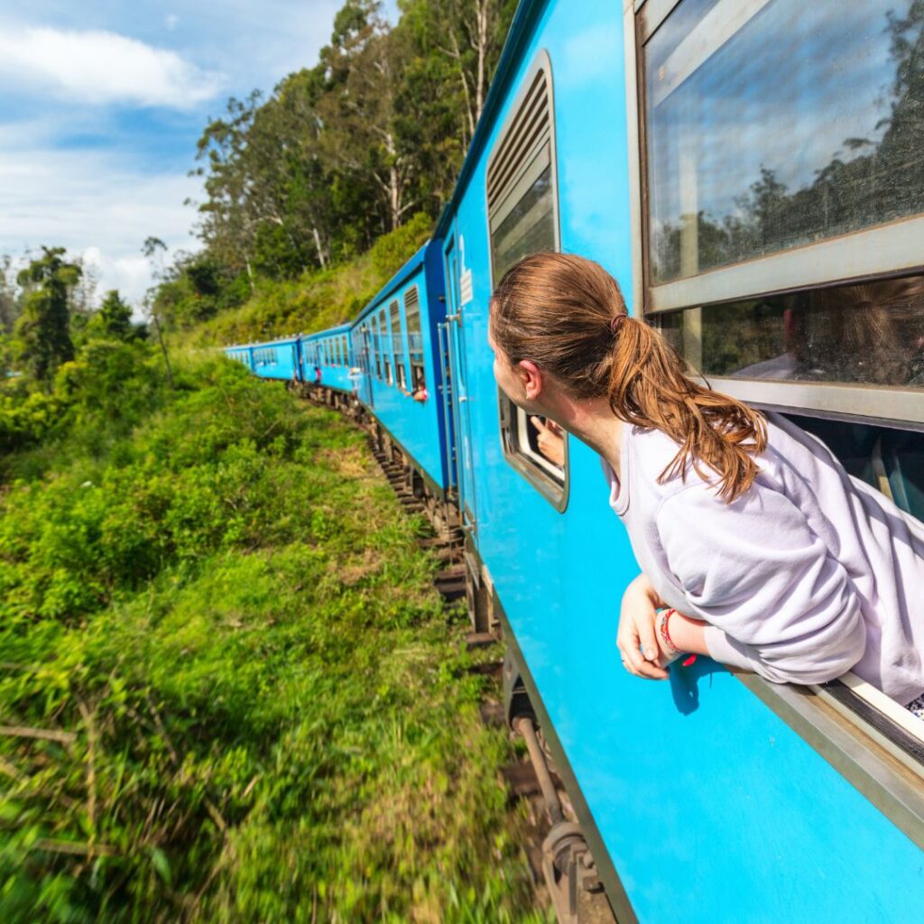 The 30 Best Things To Do On Kauai | A Bucket List Guide (2025) Hawaii Calling a woman looking out of a window of a train