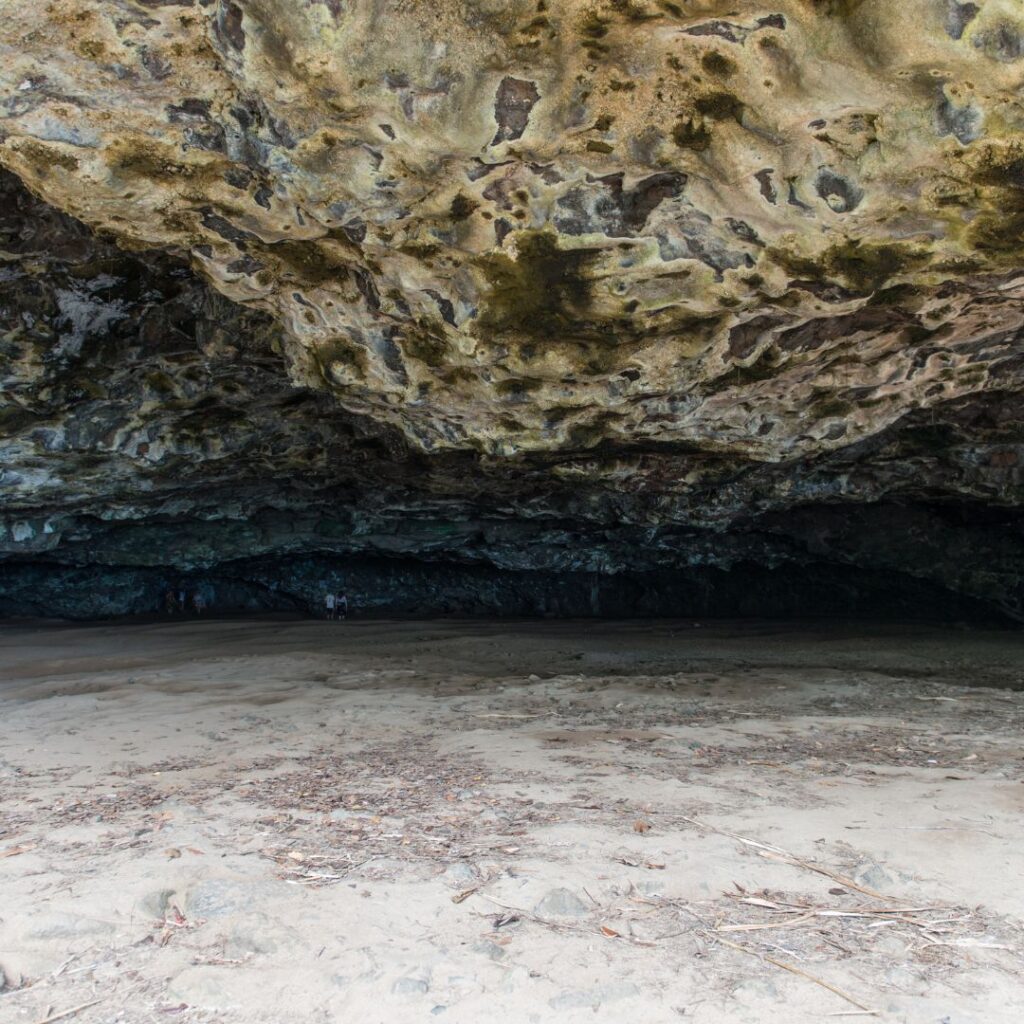 The 30 Best Things To Do On Kauai | A Bucket List Guide (2025) Hawaii Calling a cave with a sandy area