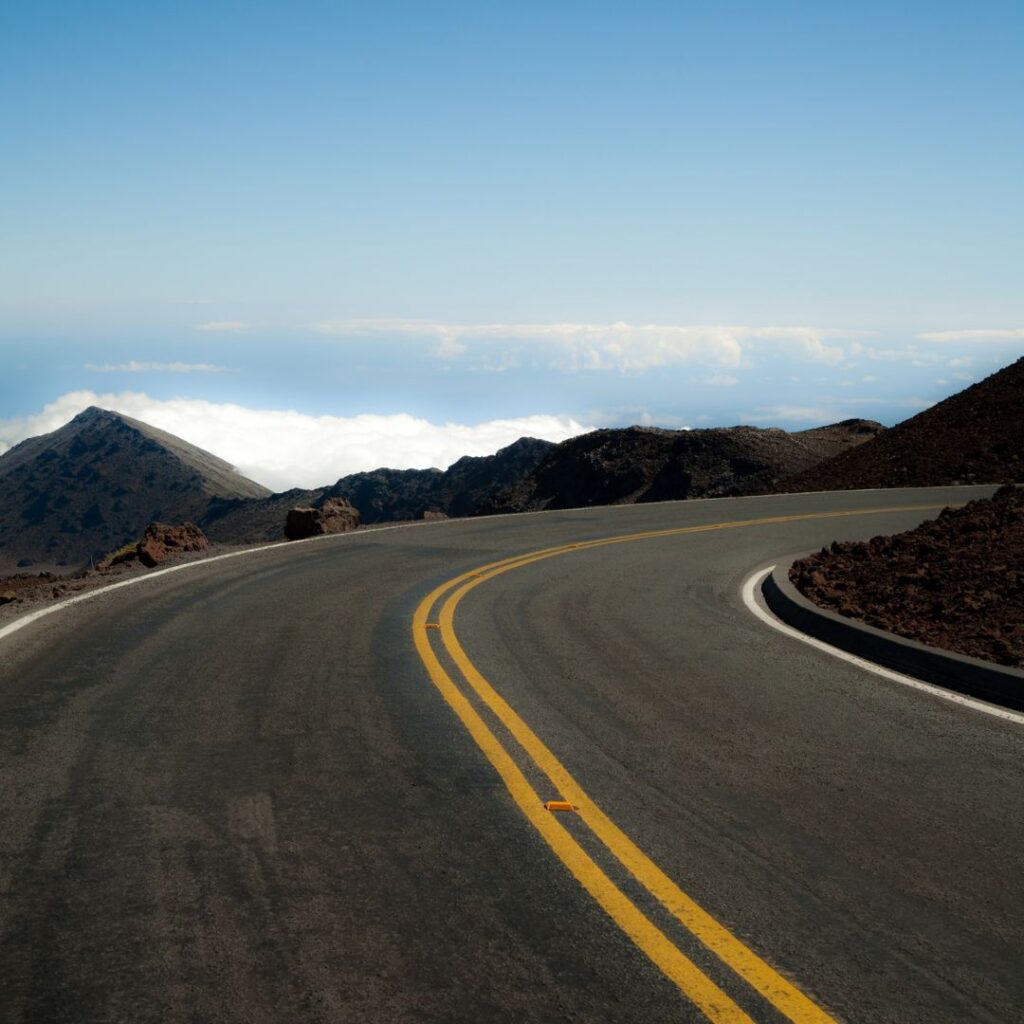 The 26 Best Things To Do On Maui | Bucket List Guide (2025) Hawaii Calling a road with a yellow line on the side