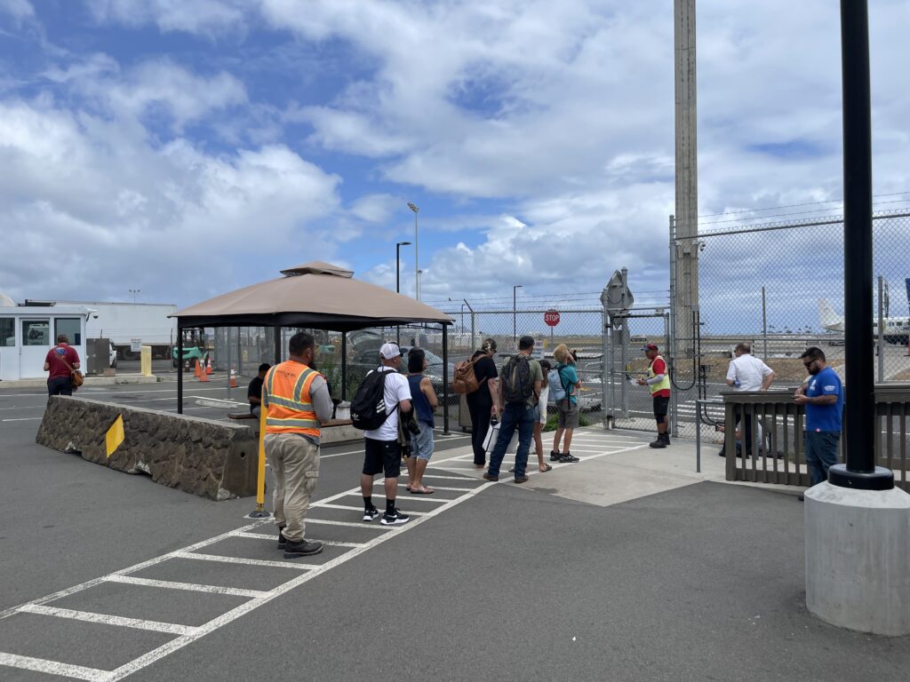 Mokulele Flight Review Honolulu To Kapalua | Exciting Small Plane Adventure Hawaii Calling a group of people standing in a parking lot