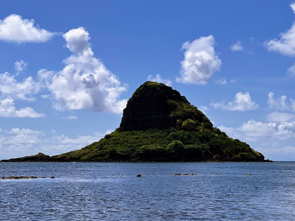Journey to Chinamans Hat: The Fascinating Beauty of Mokoli'i Explored Hawaii Calling a small island in the water