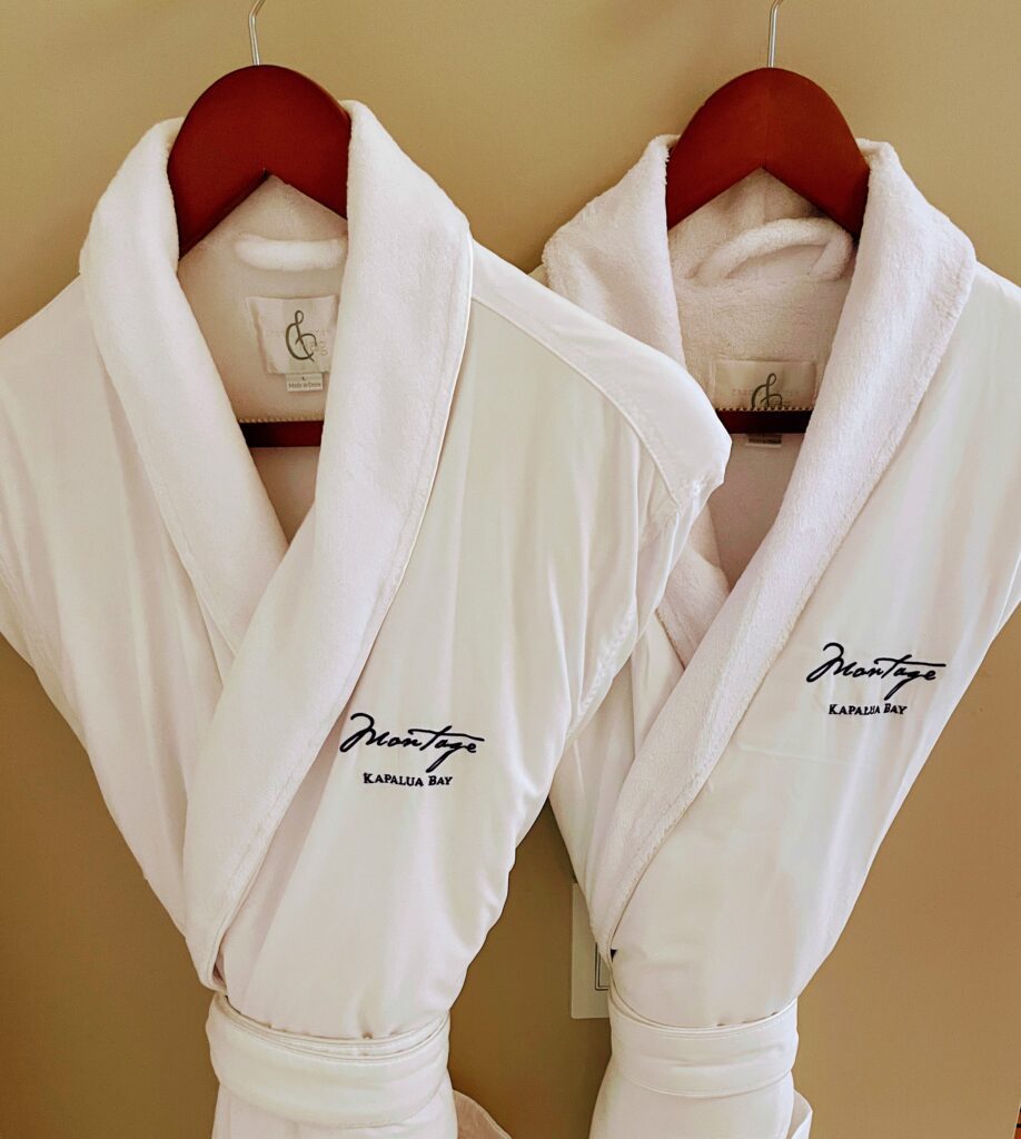12 Plush & Cozy Hotel Robes Of The World Hawaii Calling a couple white bathrobes on a wall