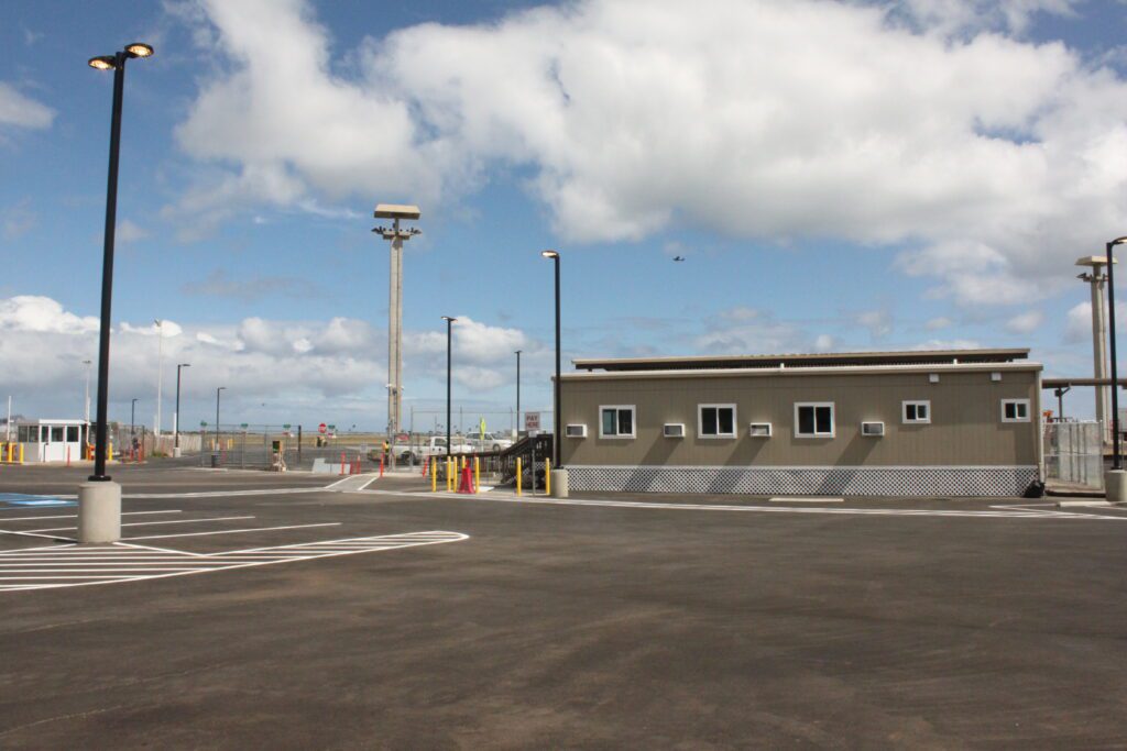 Mokulele Flight Review Honolulu To Kapalua | Exciting Small Plane Adventure Hawaii Calling a building with a parking lot