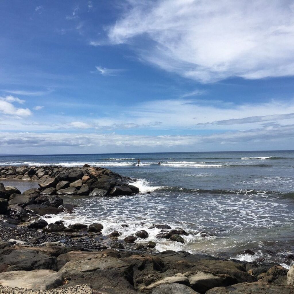 Snorkeling on Maui: The Ultimate Guide To 27 Amazing Spots Hawaii Calling a rocky beach with waves crashing on rocks