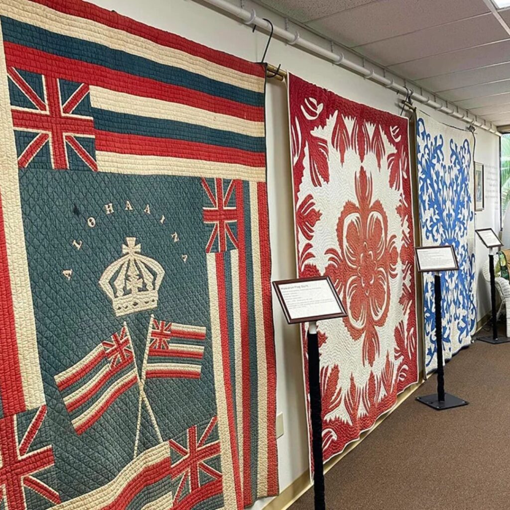 The 49 Best Things To Do In Kona Hawaii Calling a row of quilts on a wall