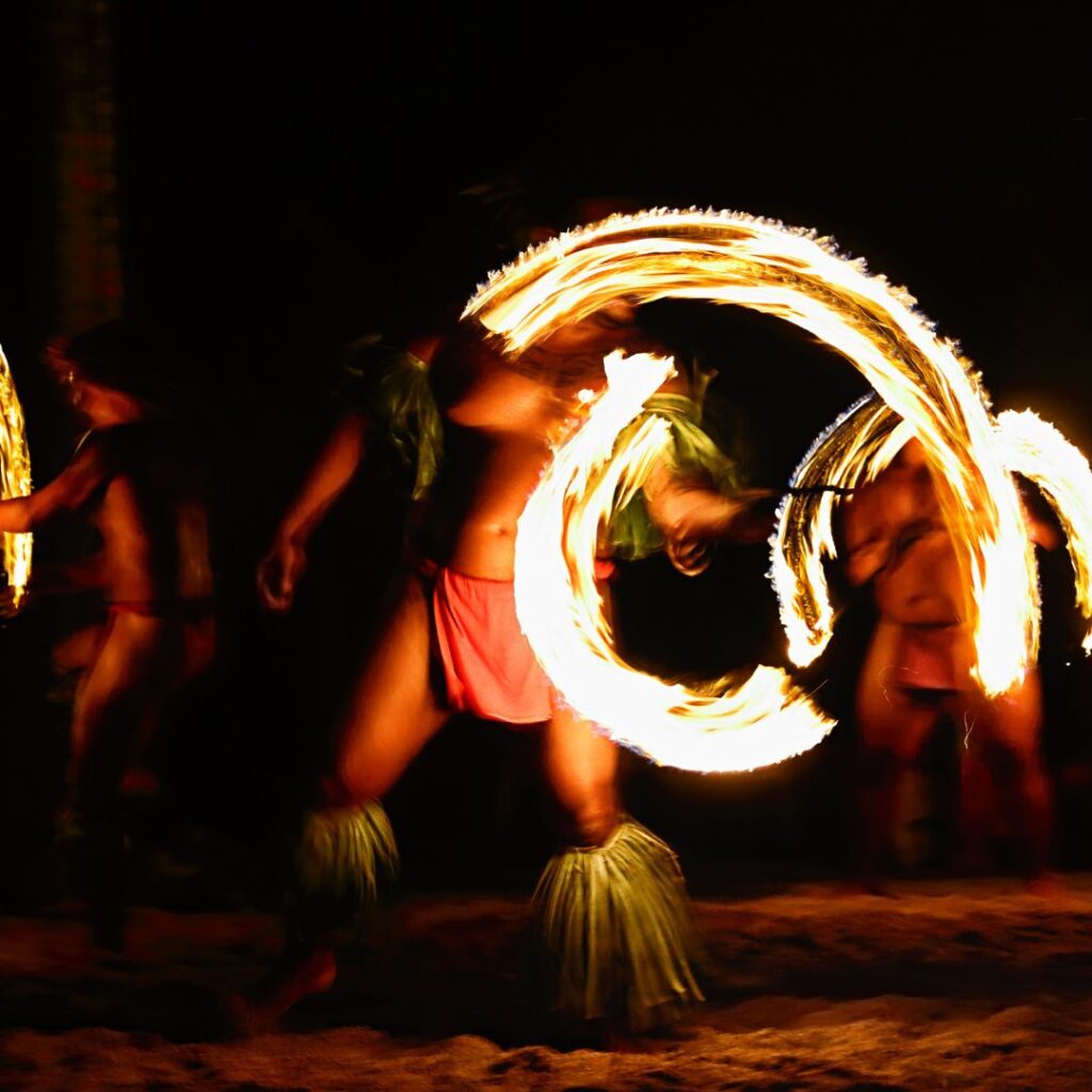 The 49 Best Things To Do In Kona Hawaii Calling a group of people dancing with fire