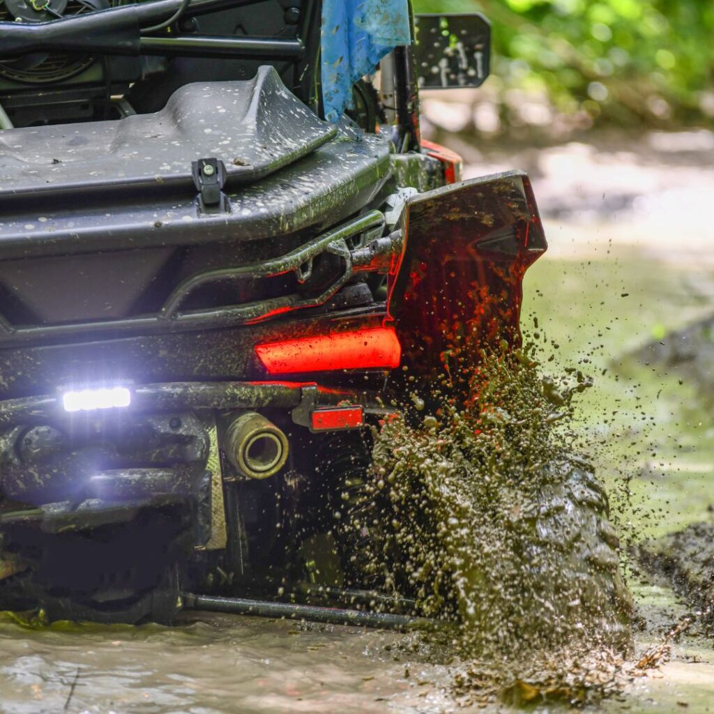 The 26 Best Things To Do On Maui | Bucket List Guide (2025) Hawaii Calling a close up of a vehicle splashing mud
