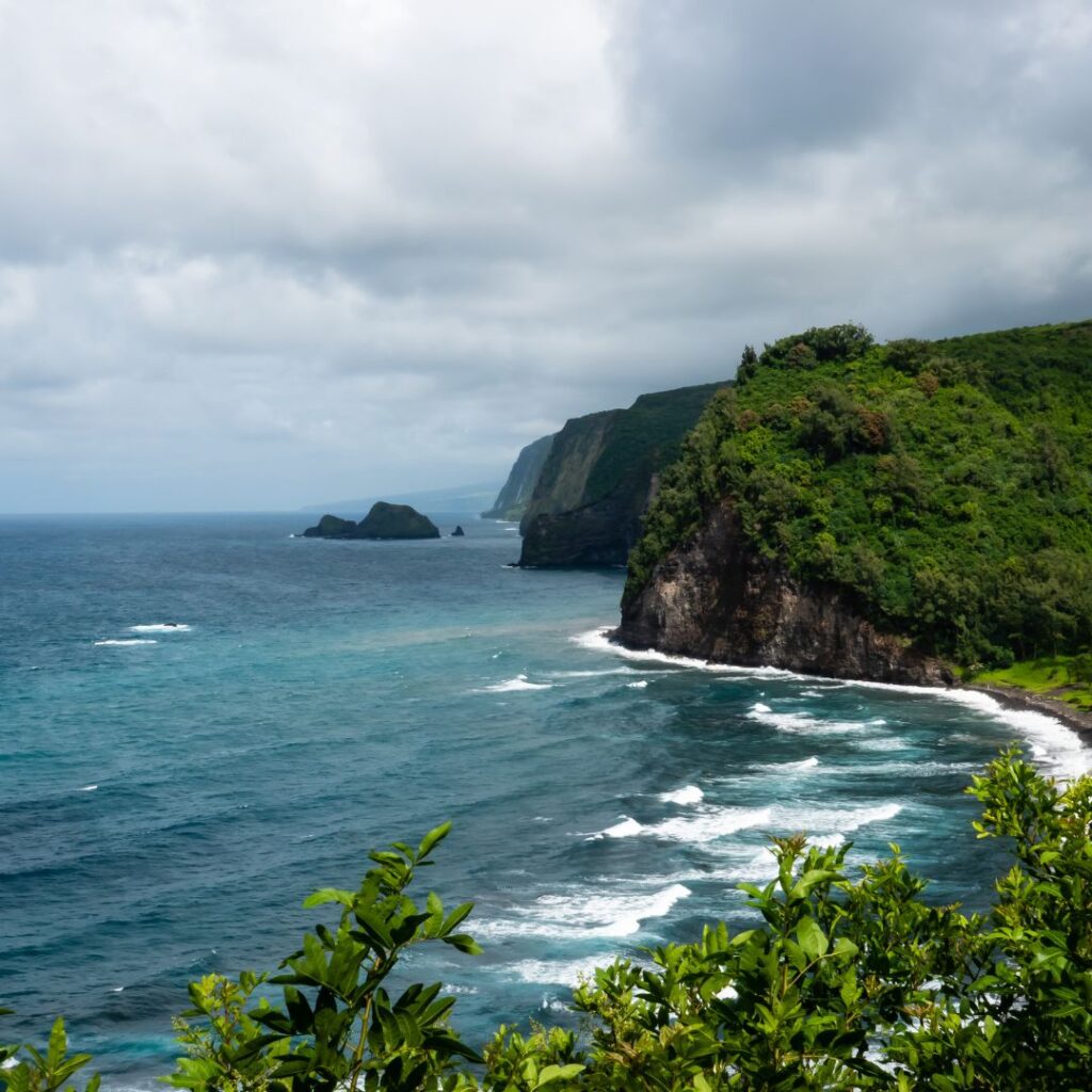 35 Best Things To Do On The Big Island Hawaii Calling a body of water with a cliff and trees