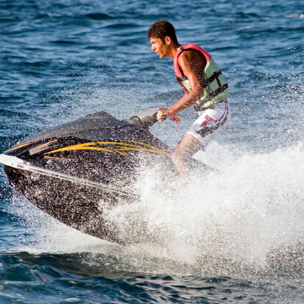 15 Best Snorkel Tours On Oahu | Book These Early Hawaii Calling a man on a jet ski
