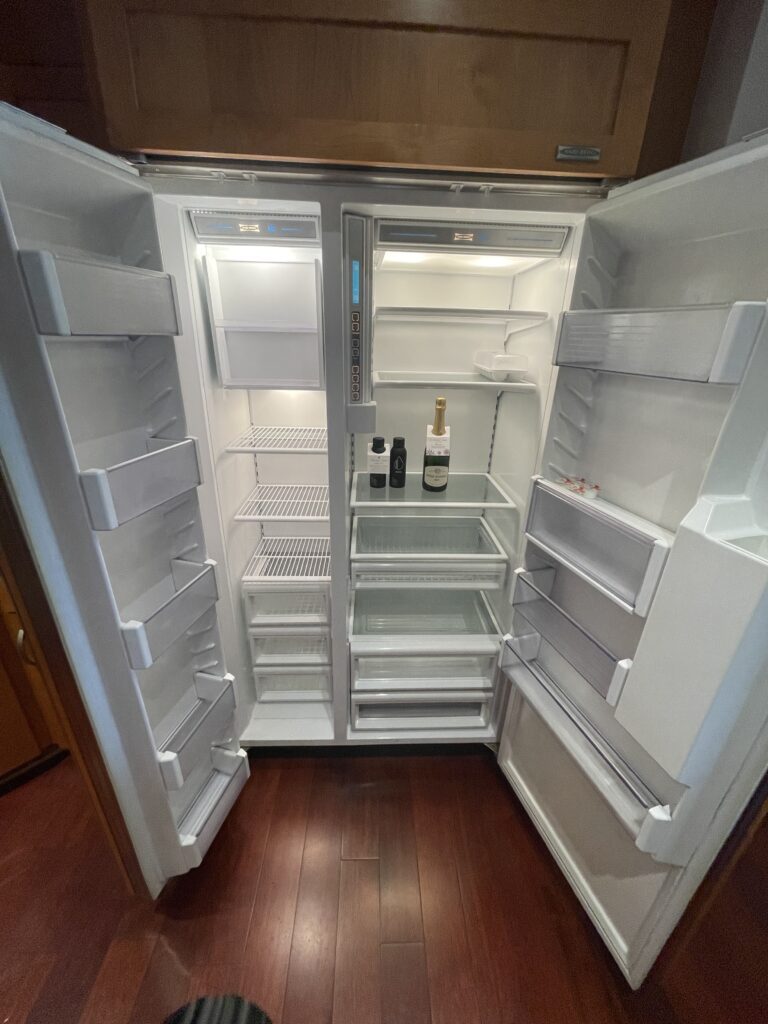 Review Montage Kapalua Bay | Maui Luxury Hawaii Calling a refrigerator with shelves and bottles of wine