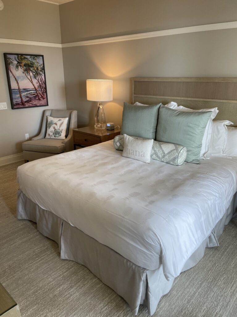 Review Montage Kapalua Bay | Maui Luxury Hawaii Calling a bed with a lamp and a table