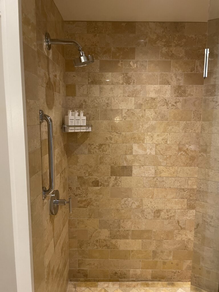 Review Montage Kapalua Bay | Maui Luxury Hawaii Calling a shower with a shower head and a bar