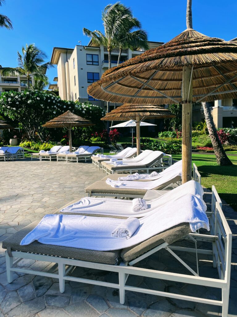 Review Montage Kapalua Bay | Maui Luxury Hawaii Calling a lounge chairs and umbrellas by a building
