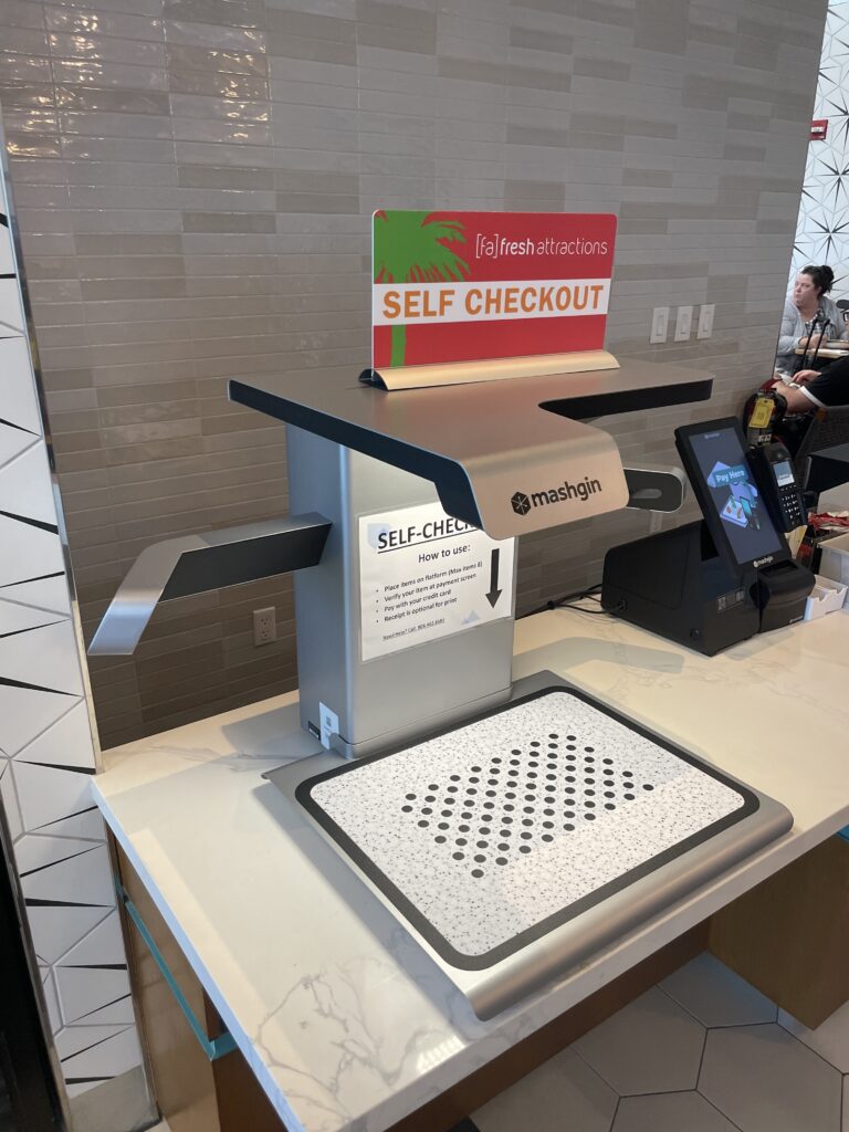 Mauka Market Restaurant Review | Excellent Food At Honolulu Airport Hawaii Calling a self checkout machine on a counter