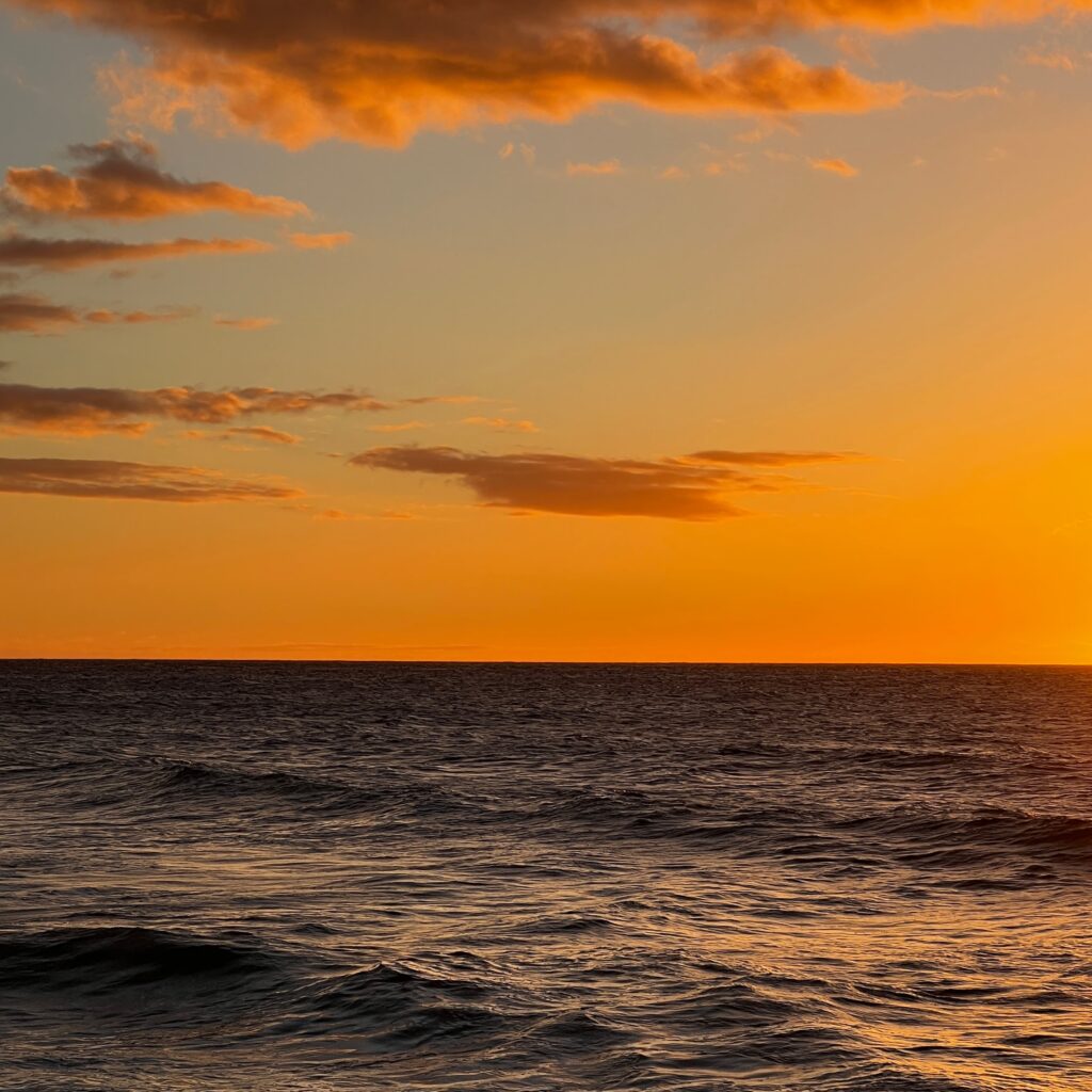 Kalalau Trail Adventure: My Unforgettable Hiking Experience on Kaua'i Hawaii Calling a sunset over the ocean