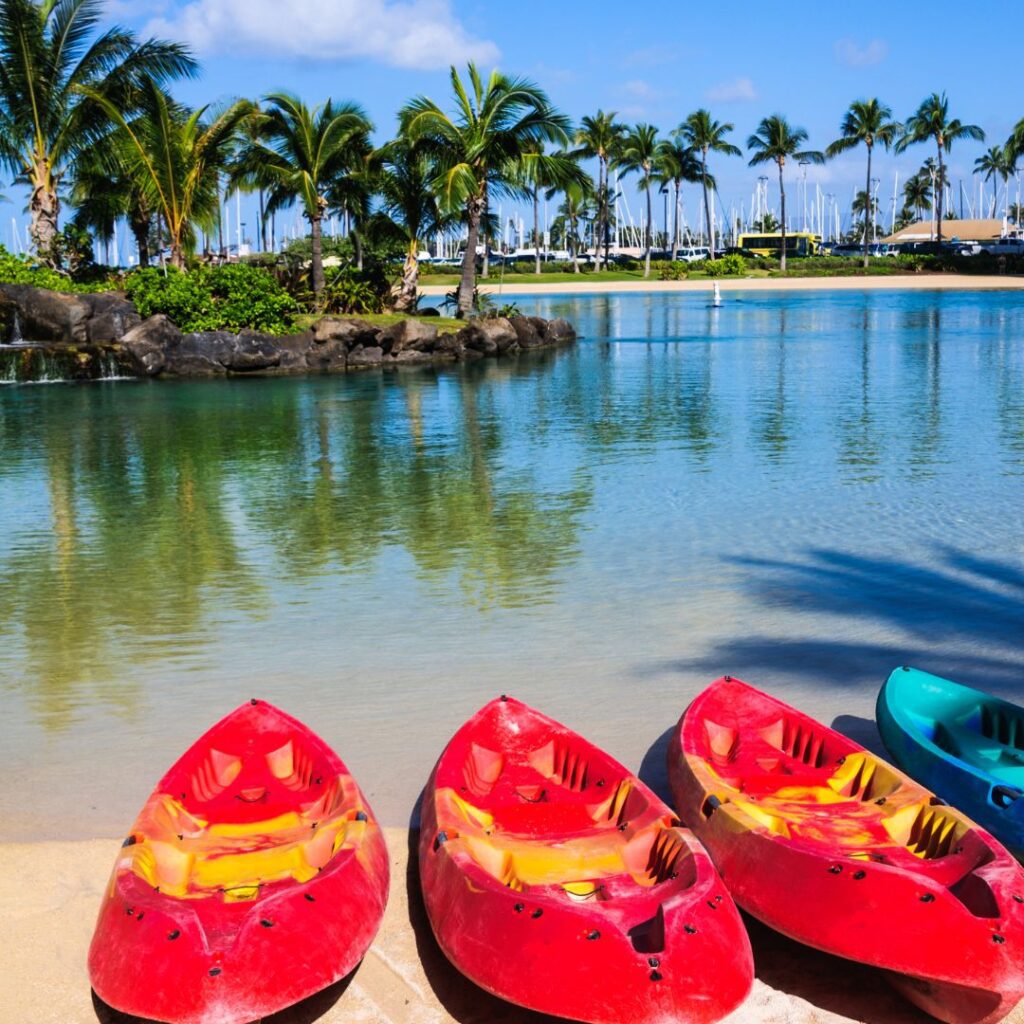 10 Breathtaking Honolulu Water Activities You Have To Experience (2025) Hawaii Calling a group of kayaks on a beach
