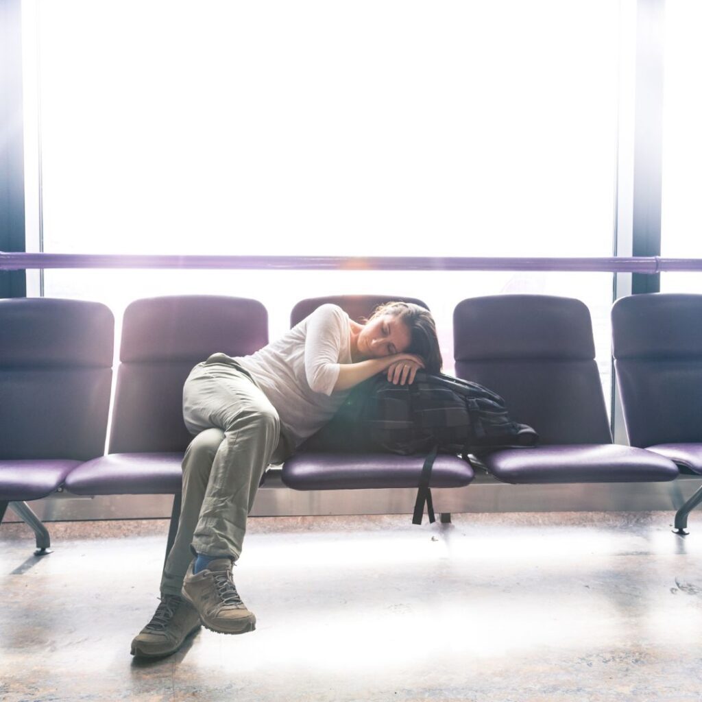 How Long Are Flights To Hawaii? A Look At The Timeline To Paradise Hawaii Calling a woman sleeping on a bench