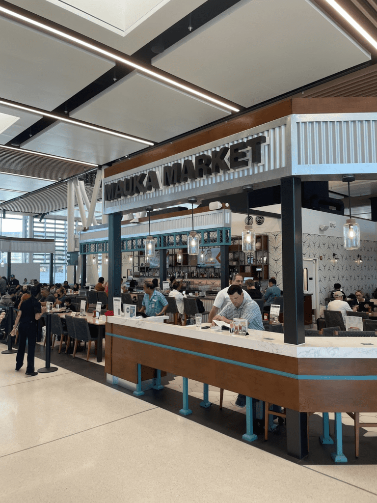 Mauka Market Restaurant Review | Excellent Food At Honolulu Airport Hawaii Calling a group of people in a restaurant