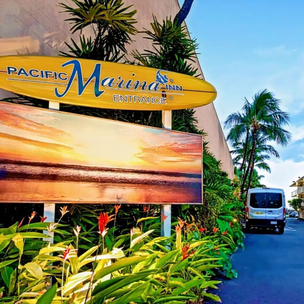 20 Best Budget Hotels On Oahu (2025) Comfort and Convenience for Every Wallet Hawaii Calling a sign outside of a building