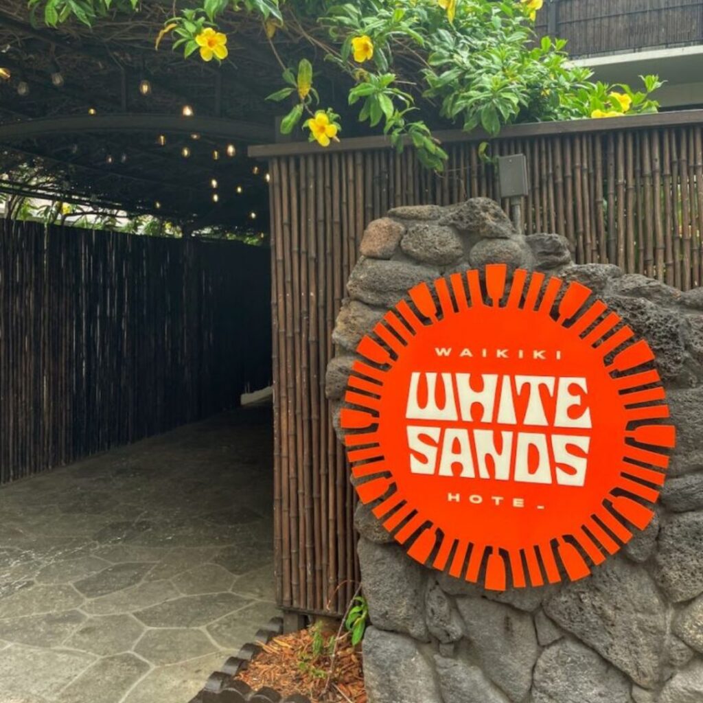 20 Best Budget Hotels On Oahu (2025) Comfort and Convenience for Every Wallet Hawaii Calling a sign on a stone wall
