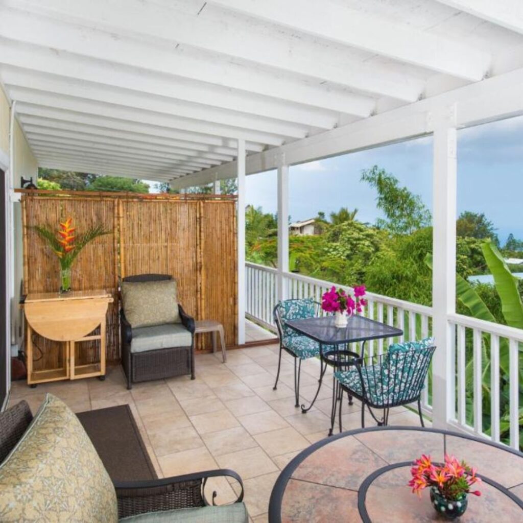 a patio with chairs and tables