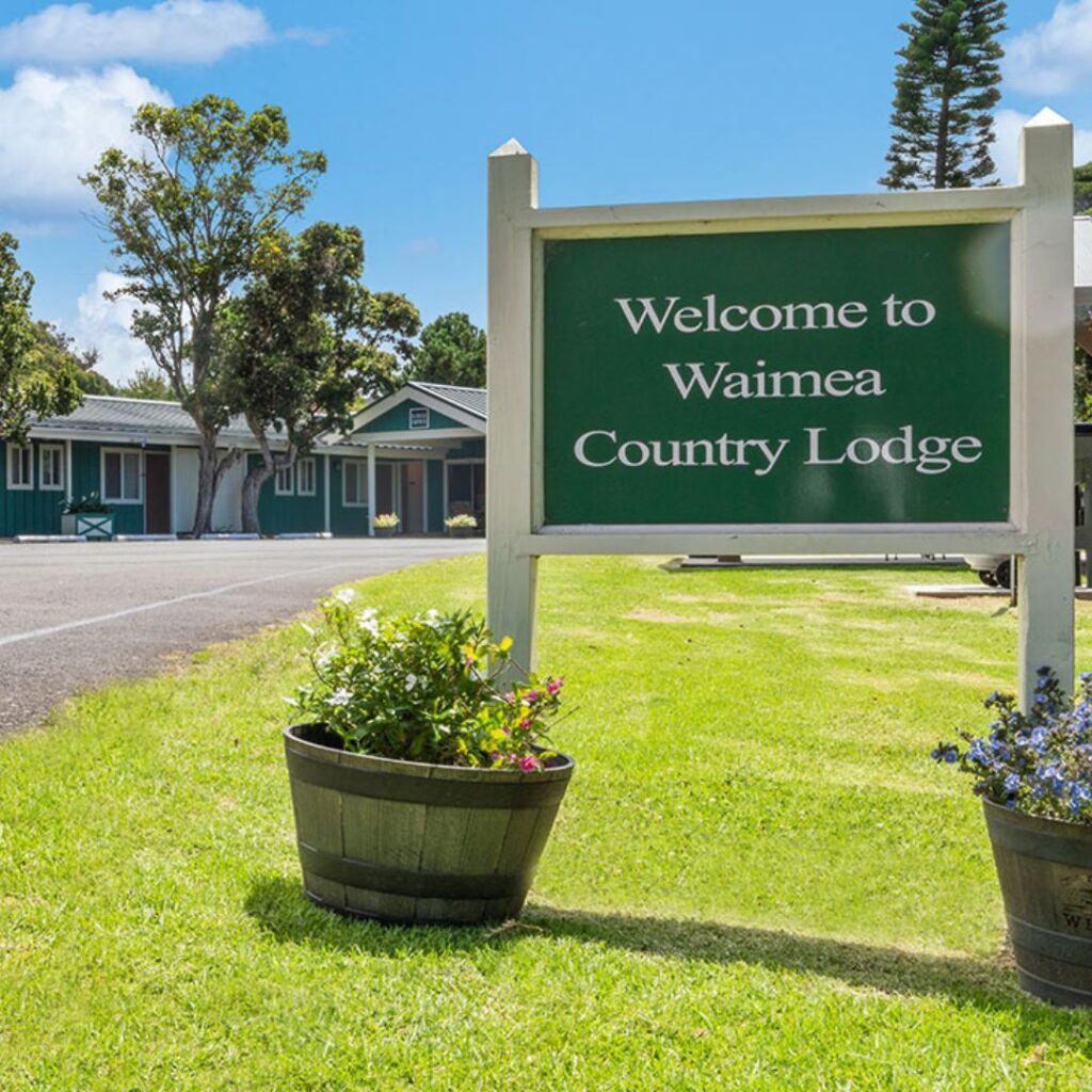 a sign in front of a building