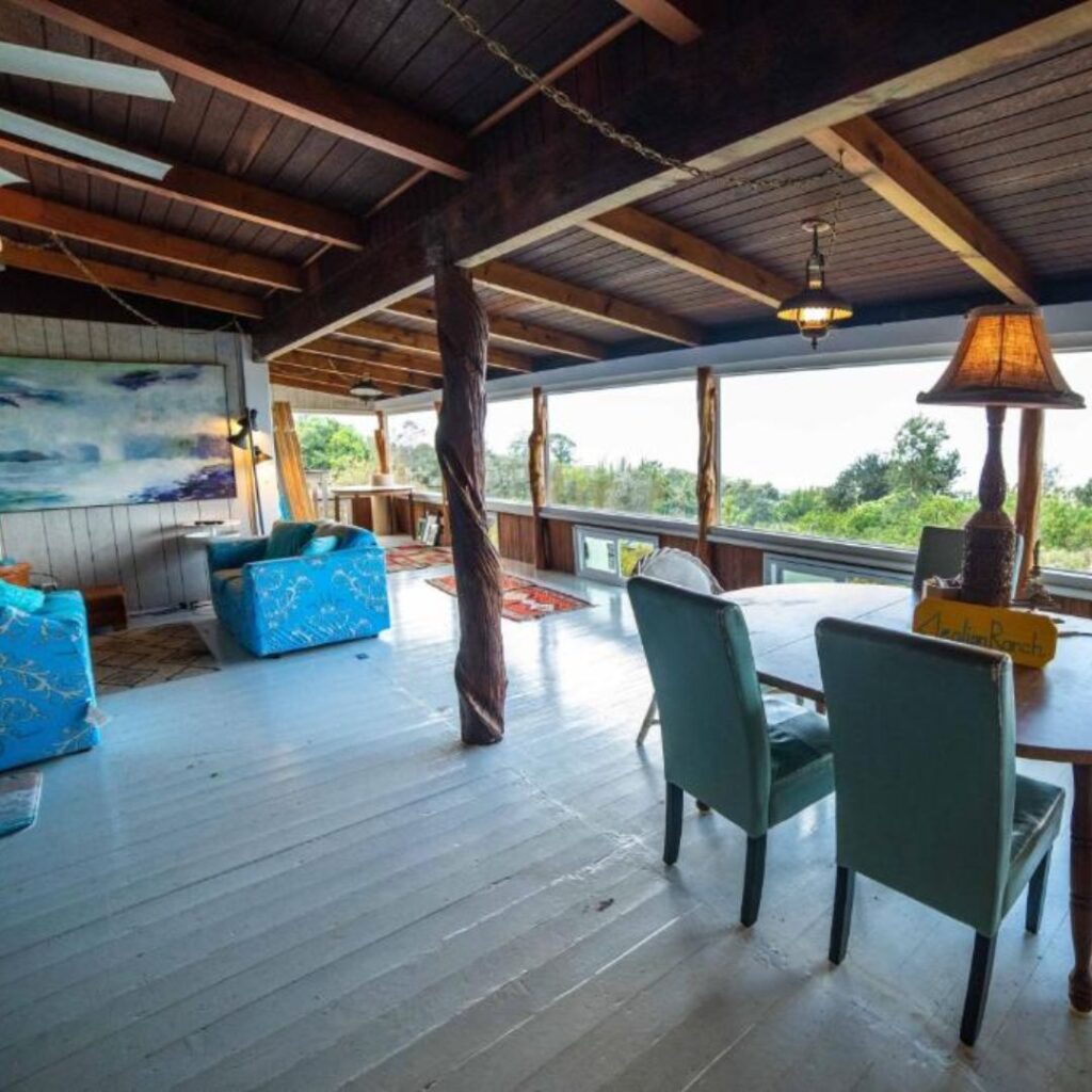 a room with a table and chairs