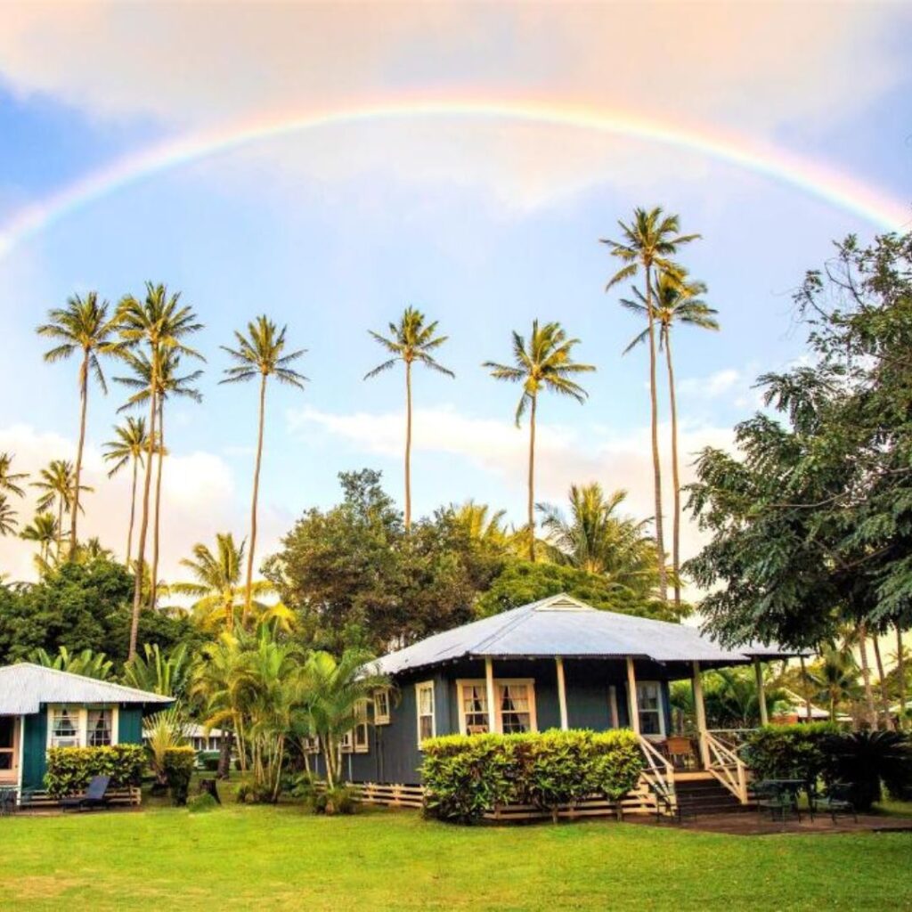 15 Top-Rated Budget Hotels On Kaua'i: Affordable Luxury Hawaii Calling a rainbow over a house