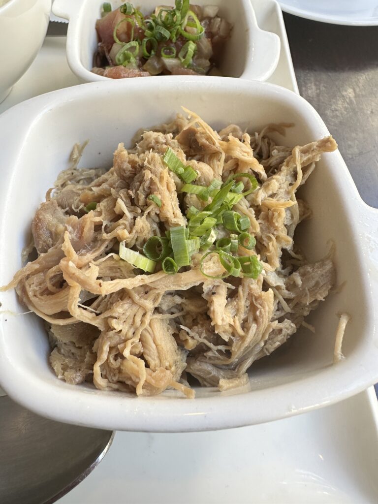 Kalo Hawaiian Food by Chai's | Unique Flavors In Waikiki Hawaii Calling a bowl of food on a tray