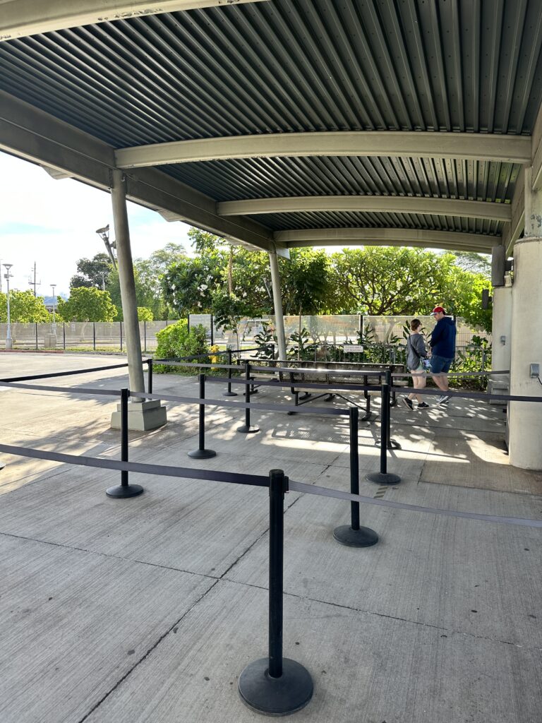 Volunteering At The Battleship Missouri Memorial | Amazing History Behind The Scenes Hawaii Calling a couple standing under a covered area