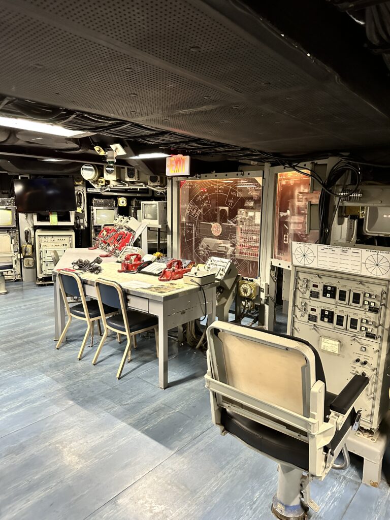 Volunteering At The Battleship Missouri Memorial | Amazing History Behind The Scenes Hawaii Calling a room with a table and chairs