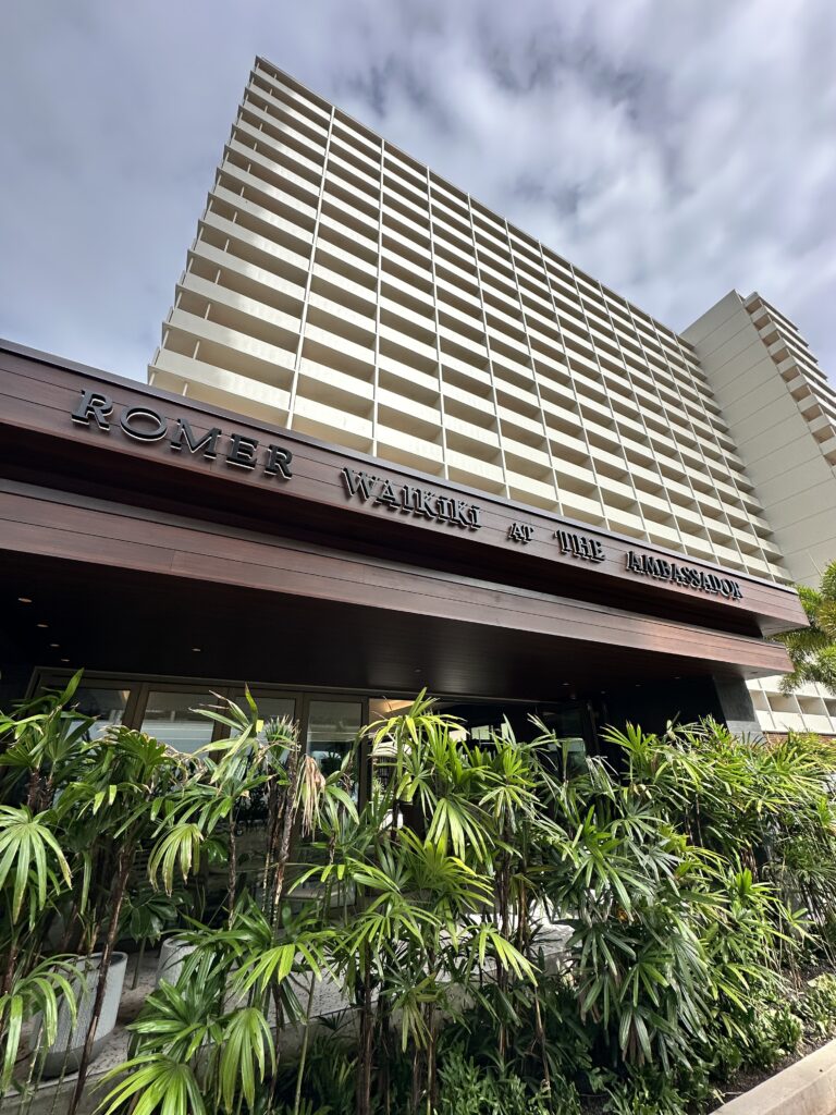 Romer Waikiki Sneak Peek | Renovations Complete Hawaii Calling a building with a sign on it