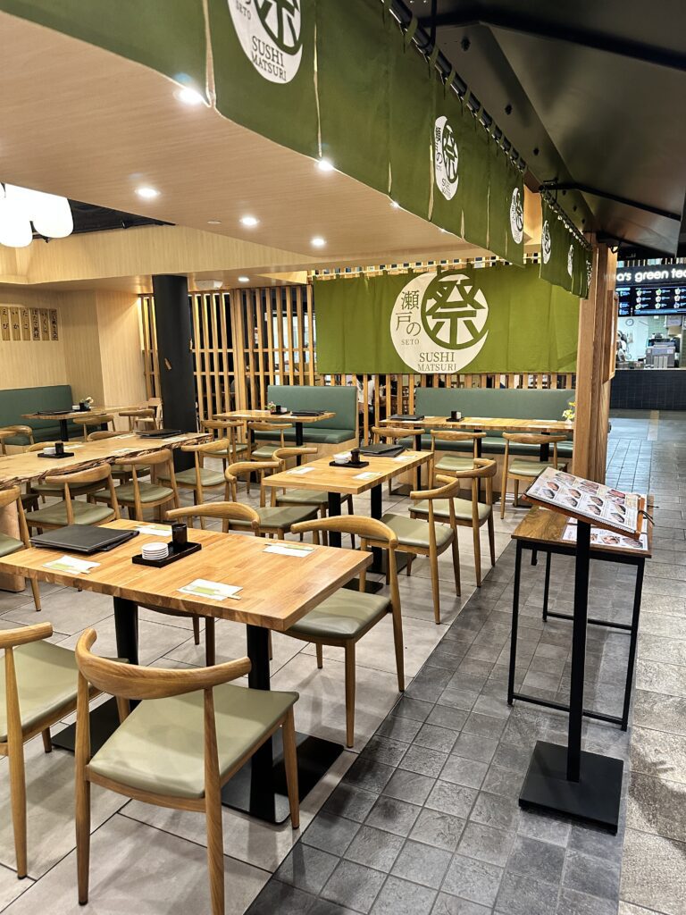 STIX Waikiki: A Foodie's Paradise in the Heart of Waikiki Beach Hawaii Calling a restaurant with tables and chairs