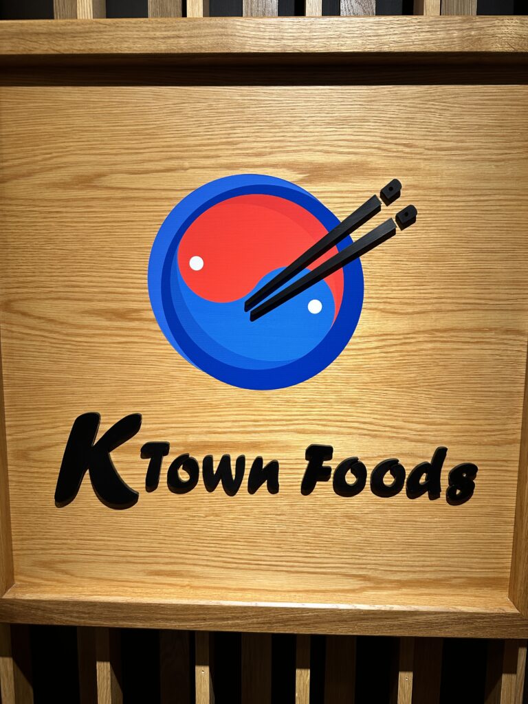 STIX Waikiki: A Foodie's Paradise in the Heart of Waikiki Beach Hawaii Calling a sign with chopsticks and a blue circle with red and blue circle