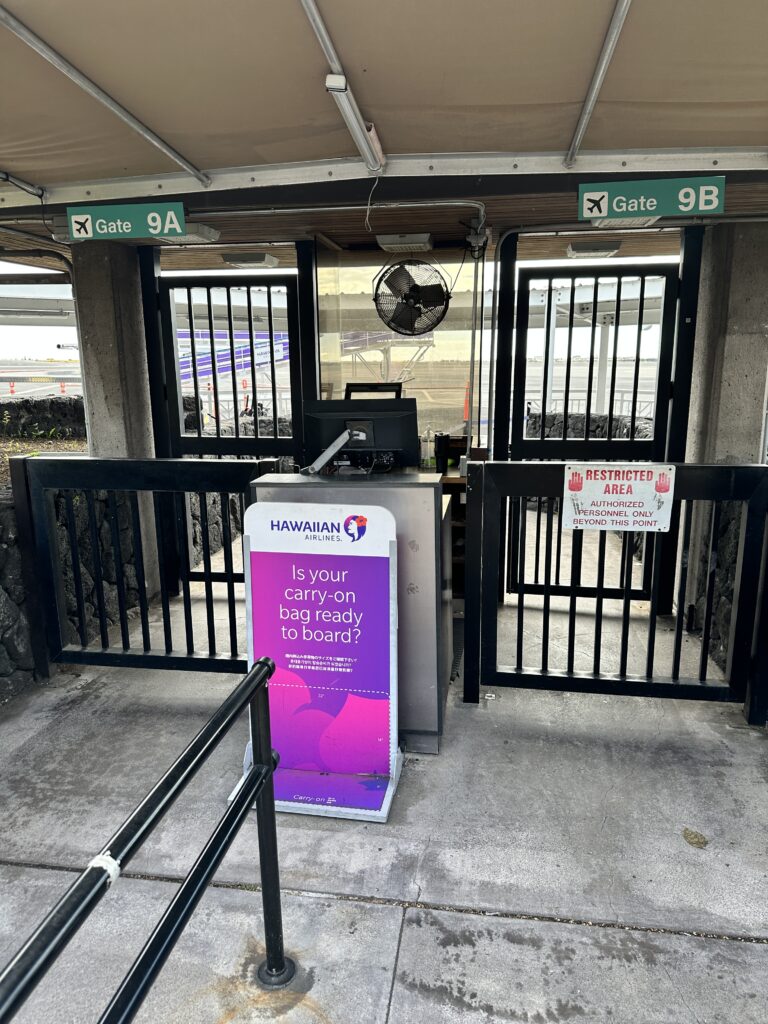 Review: Hawaiian Airlines Boeing 717 Economy KOA-HNL Kona To Honolulu Hawaii Calling a gate with a sign and a fan
