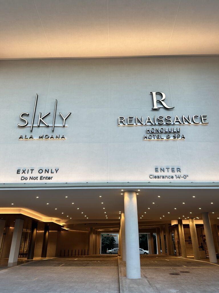 Hawai'i Travel News November 2023 | New Hotels & Flight Updates Hawaii Calling a building with a sign on it